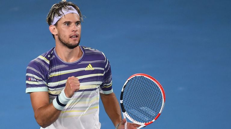 Austria's Dominic Thiem celebrates a point against Germany's Alexander Zverev during their men's singles semi-final match on day twelve of the Australian Open tennis tournament in Melbourne on January 31, 2020.