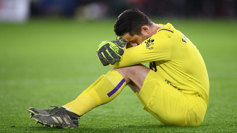 SHEFFIELD, ENGLAND - JANUARY 10: Lukasz Fabianski of West Ham United goes down injured during the Premier League match between Sheffield United and West Ham United at Bramall Lane on January 10, 2020 in Sheffield, United Kingdom. (Photo by Laurence Griffiths/Getty Images)