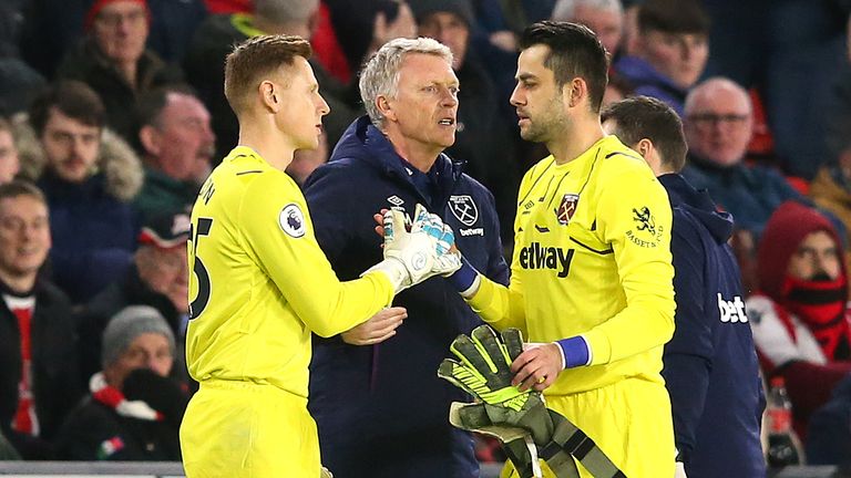 SHEFFIELD, ENGLAND - JANUARY 10: Lukasz Fabianski of West Ham United goes down injured during the Premier League match between Sheffield United and West Ham United at Bramall Lane on January 10, 2020 in Sheffield, United Kingdom. (Photo by Laurence Griffiths/Getty Images)