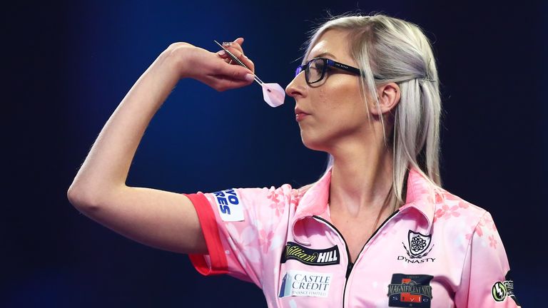 LONDON, ENGLAND - DECEMBER 27: Fallon Sherrock of England throws during her third round match against Chris Dobey of England on Day 12 of the 2020 William Hill World Darts Championship at Alexandra Palace on December 27, 2019 in London, England. (Photo by Jordan Mansfield/Getty Images)