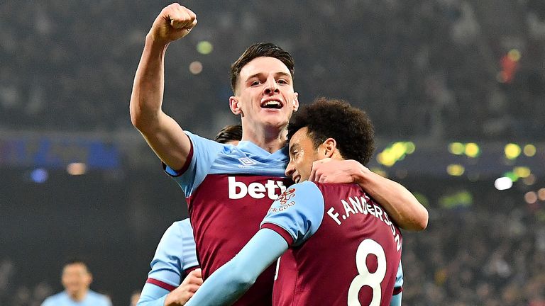 Felipe Anderson celebrates scoring his team's fourth goal with Declan Rice