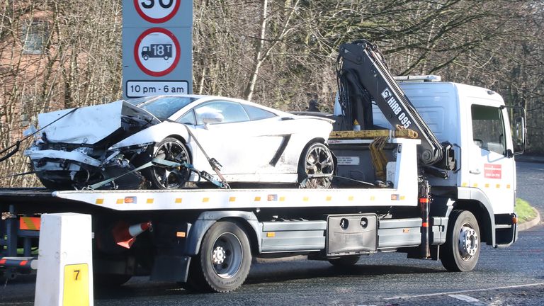Sergio Romero's Lamborghini is towed away following his crash near Carrington on Monday