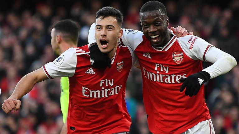 Arsenal goalscorer Gabriel Martinelli celebrates Nicolas Pepe