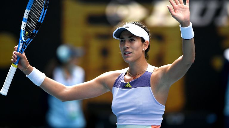 Spain's Garbine Muguruza celebrates after beating Netherlands' Kiki Bertens during their women's singles match on day eight of the Australian Open tennis tournament in Melbourne on January 27, 2020.