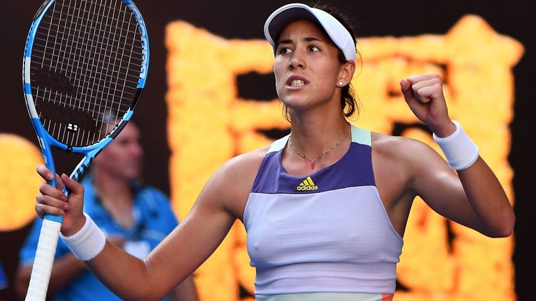 Spain's Garbine Muguruza celebrates after beating Romania's Simona Halep during their women's singles semi-final match on day eleven of the Australian Open tennis tournament in Melbourne on January 30, 2020
