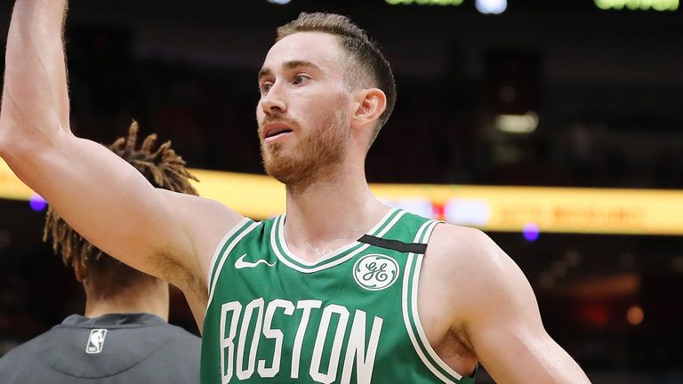 Gordon Hayward high-fives team-mates during Boston's win in Miami