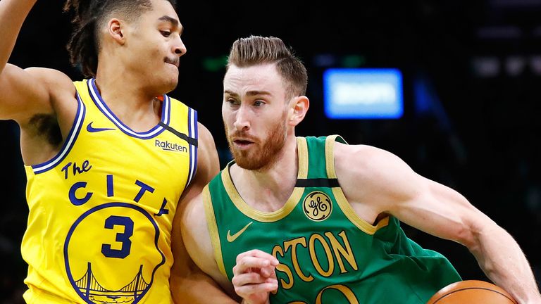 Gordon Hayward drives at the Golden State Warriors' defense