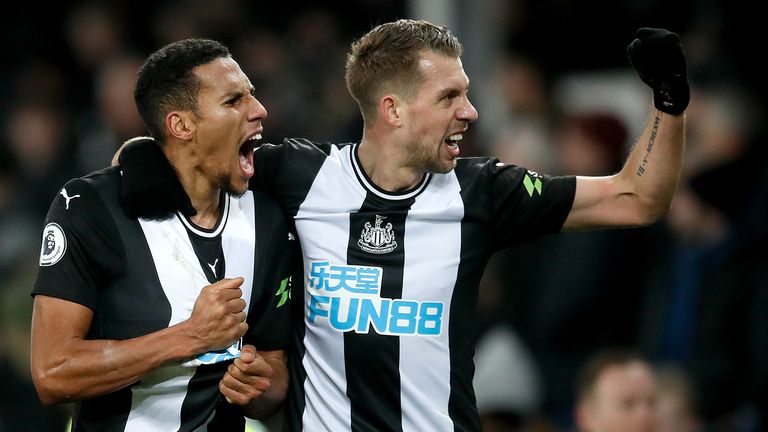 Isaac Hayden and Florian Lejeune celebrate Newcastle's stoppage-time equaliser
