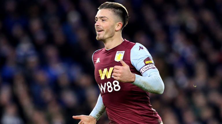 Jack Grealish celebrates scoring Villa's equaliser at the AMEX Stadium