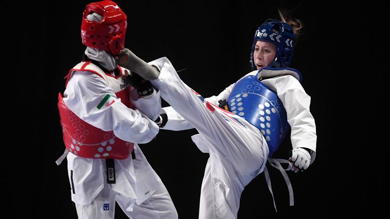 Jade Jones (right) earned the nickname of 'The Headhunter' when she arrived at the British Taekwondo Academy in Manchester in 2009