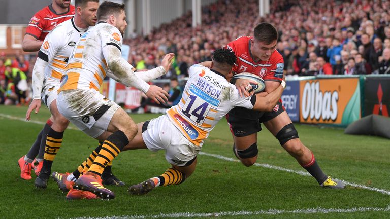 Gloucester player Jake Polledri gets past Wasps wing Marcus Watson to score the third Gloucester try during the Gallagher Premiership Rugby match between Gloucester Rugby and Wasps at Kingsholm Stadium on March 23, 2019 in Gloucester, United Kingdom