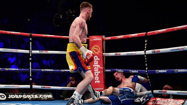 BELFAST, NORTHERN IRELAND - OCTOBER 21: James Tennyson of Northern Ireland knocks out Darren Traynor of Scotland during their WBA International Super-Featherweight Championship bout on the Burnett versus Zhakiyanov boxing bill at SSE Arena Belfast on October 21, 2017 in Belfast, Northern Ireland. (Photo by Charles McQuillan/Getty Images)