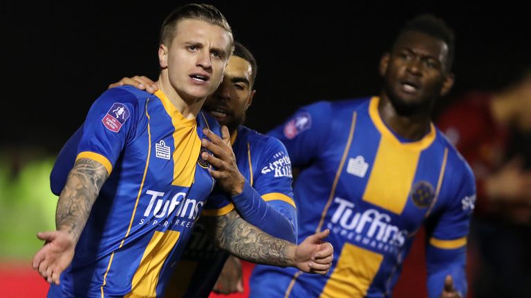 Jason Cummings scored twice off the bench to bring Shrewsbury level against Liverpool