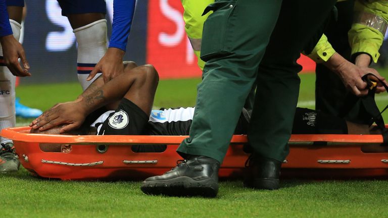 Newcastle United&#39;s Dutch defender Jetro Willems reacts as he is stretchered off injured during the English Premier League football match between Newcastle United and Chelsea at St James&#39; Park in Newcastle-upon-Tyne, north east England on January 18, 2020.