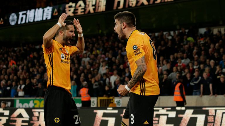 Ruben Neves celebrates his goal for Wolves against Manchester United with team-mate Joao Moutinho