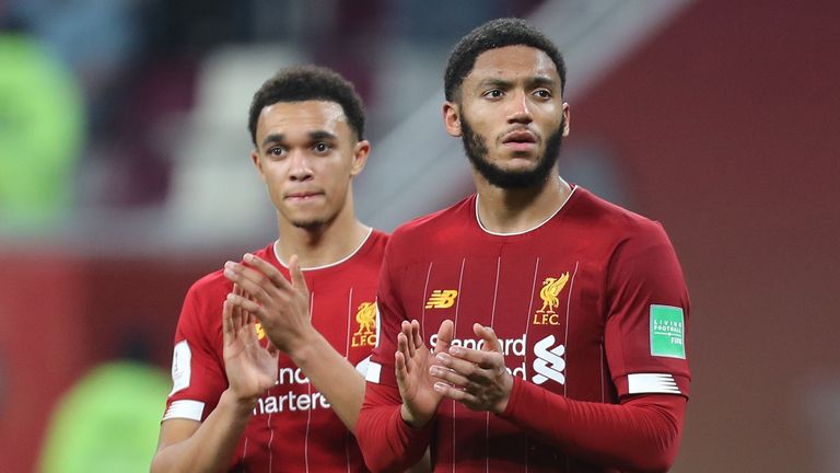 Liverpool&#39;s English defender Trent Alexander-Arnold (L) and Liverpool&#39;s English defender Joe Gomez greet the fans following the 2019 FIFA Club World Cup semi-final football match between Mexico&#39;s Monterrey and England&#39;s Liverpool at the Khalifa International Stadium in the Qatari capital Doha on December 18, 2019.
