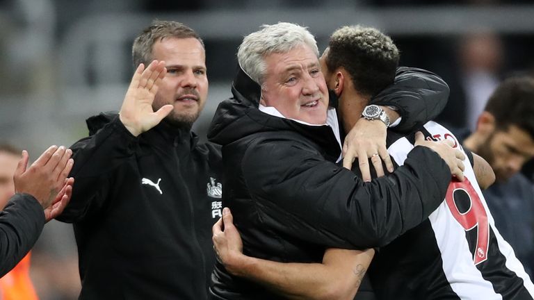 Newcastle United's Joelinton celebrates scoring his side's fourth goal of the game against Rochdale with manager Steve Bruce