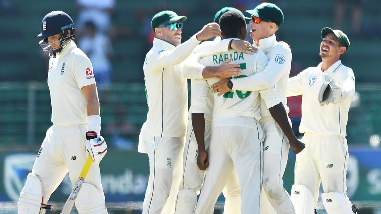 Kagiso Rabada celebrates after taking the wicket of Joe Root 