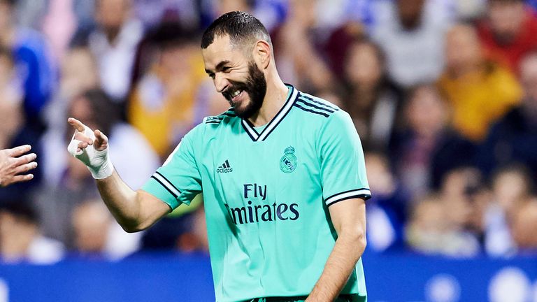 Karim Benzema celebrates his goal as Real Madrid progressed to the quarter-finals