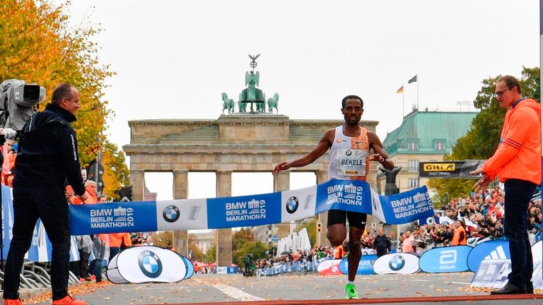 Ethiopia's Kenenisa Bekele crosses the finish line to win the 2019 Berlin Marathon 