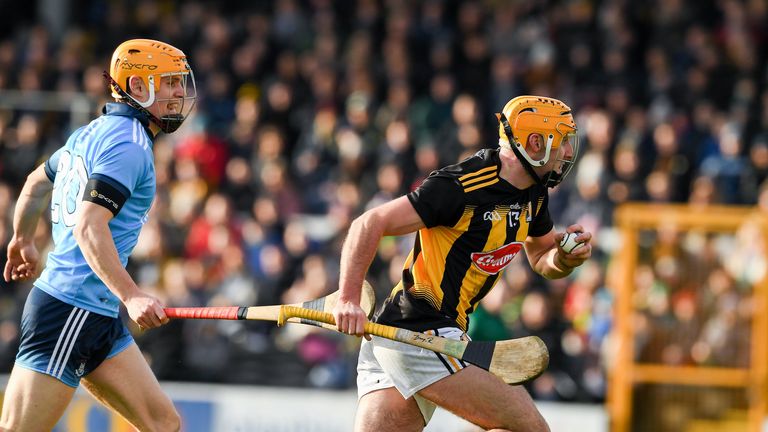 Billy Ryan of Kilkenny races past Cian O'Callaghan of Dublin on his way to score his side's second goal