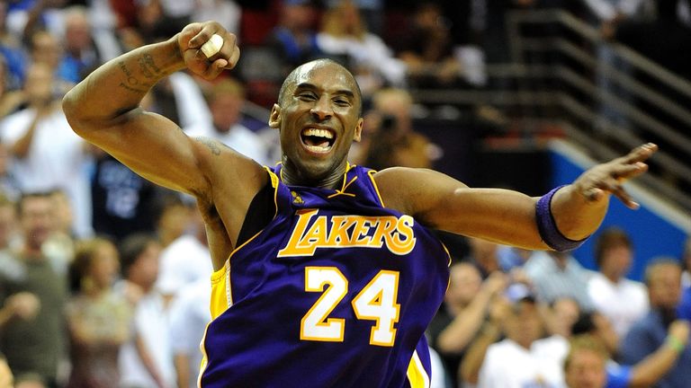 Kobe Bryant #24 of the Los Angeles Lakers celebrates after defeating the Orlando Magic 99-86 in Game Five of the 2009 NBA Finals on June 14, 2009 at Amway Arena in Orlando, Florida. 