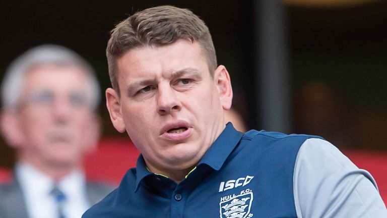 Picture by Allan McKenzie/SWpix.com - 25/05/2019 - Rugby League - Dacia Magic Weekend 2019 - Hull FC v Huddersfield Giants - Anfield, Liverpool, England - Hull FC coach Lee Radford (r) dejected after his side&#39;s heavy 55-2 defeat to Huddersfield.
