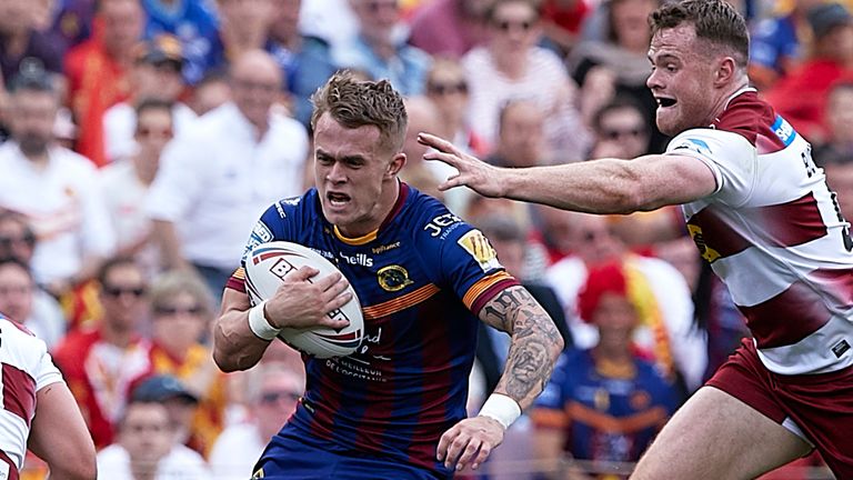 Lewis Tierney (left) in action for Catalans Dragons