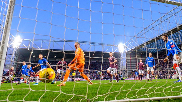 Liam Boyce's deflected strike secured a late win for Hearts