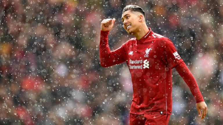 Roberto Firmino in the snow at Anfield 