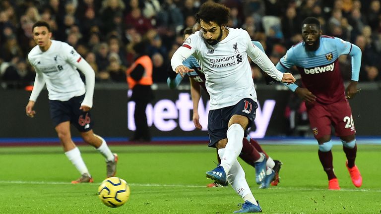 Mohamed Salah fires in from the penalty spot during the first half