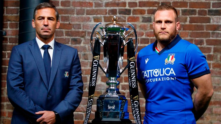 Six nations international rugby coach and captain, Italy's Franco Smith (L) and Italy's Luca Bigi, pose with the trophy during the 6 Nations Rugby Union launch event in east London on January 22, 2020. 