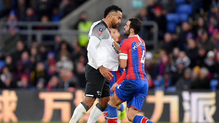 Milivojevic was sent off for this tangle with Tom Huddlestone