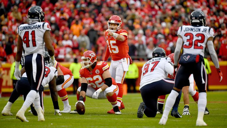 Quarterback Patrick Mahomes  of the Kansas City Chiefs calls a play on the line of scrimmage during the AFC Divisional playoff game against the Houston Texans