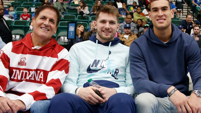 Mark Cuban, owner of the Dallas Mavericks, Luka Doncic and Dwight Powell pictured together