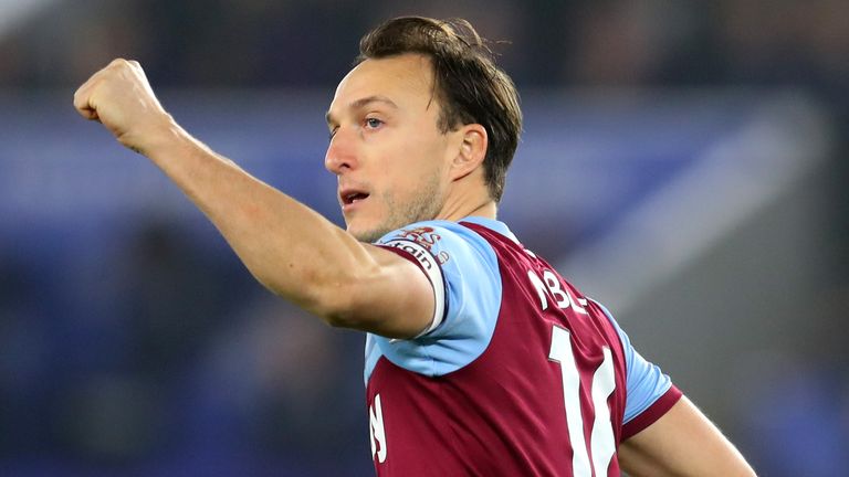 Mark Noble celebrates after converting his penalty