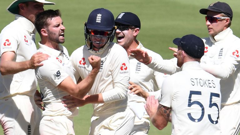 JOHANNESBURG, SOUTH AFRICA - JANUARY 27: Mark Wood and Ollie Pope of England celebrates the wicket of Rassie van der Dussen of the Proteas during day 4 of the 4th Test match between South Africa and England at Imperial Wanderers Stadium on January 27, 2020 in Johannesburg, South Africa. (Photo by Lee Warren/Gallo Images)