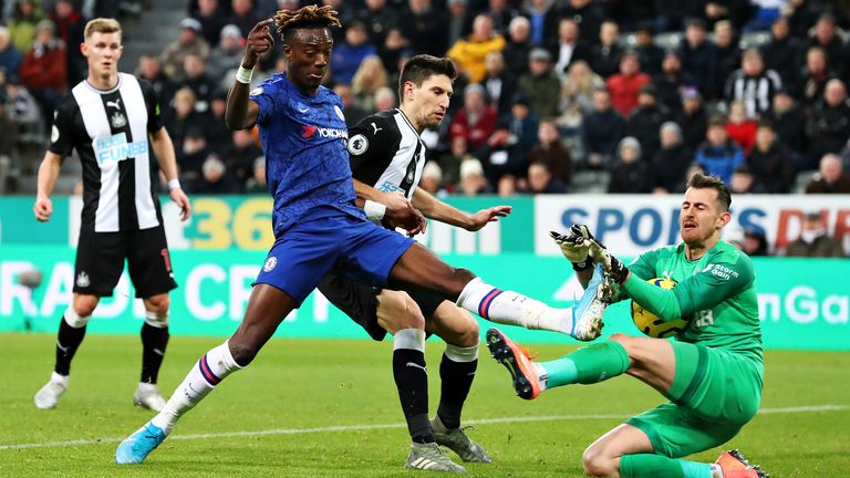  Martin Dubravka saves an attempt on goal from Tammy Abraham