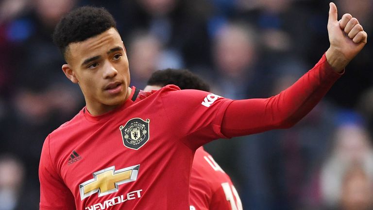 Mason Greenwood celebrates scoring Manchester United's sixth goal against Tranmere from the penalty spot