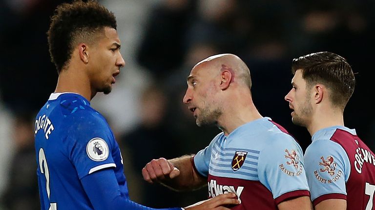 Mason Holgate is confronted by Pablo Zabaleta during the second period