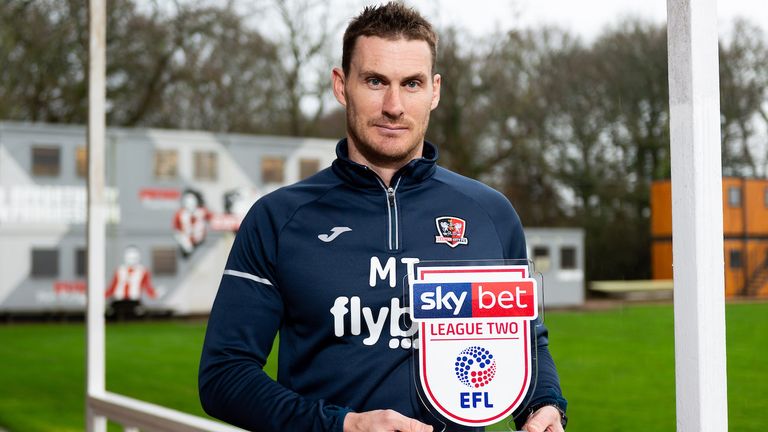 Exeter City's Matt Taylor receives the Sky Bet League Two Manager of the Month Award for December 2019 - Ryan Hiscott/JMP - 09/01/2020 - SPORT - Exeter City Training Ground - Exeter, England - Sky Bet League Two Manager of the Month - Exeter City's Matt Taylor for December 2019