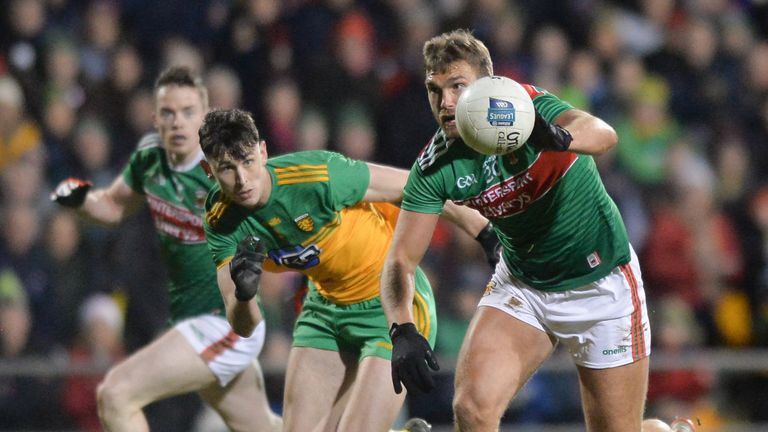 Aidan O'Shea of Mayo in action against Michael Langan of Donegal