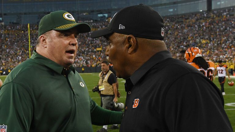 Mike McCarthy (L) and Marvin Lewis (R) have both met with the Cowboys