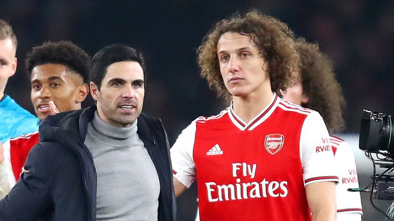Mikel Arteta and David Luiz leave the pitch after the recent 2-0 win over Manchester United