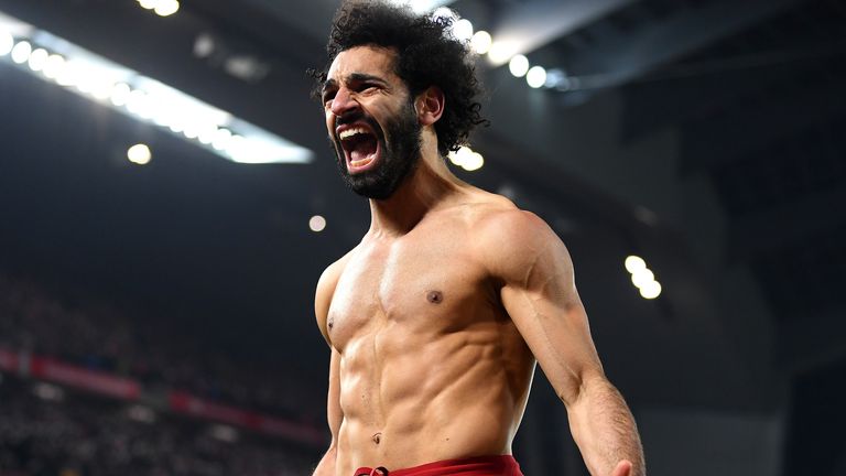 Mohamed Salah celebrates scoring for Liverpool against Manchester United at Anfield