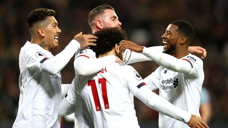 Mohamed Salah celebrates with Liverpool team-mates after scoring against West Ham