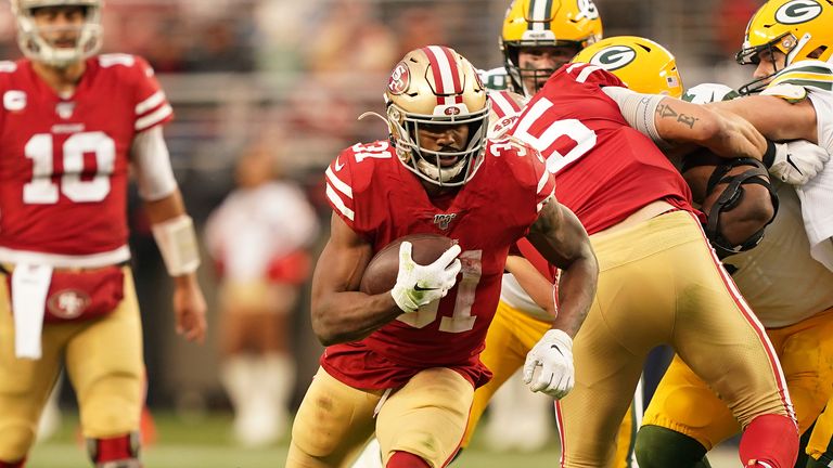 Raheem Mostert #31 of the San Francisco 49ers runs the ball in the first half against the Green Bay Packers during the NFC Championship game at Levi's Stadium