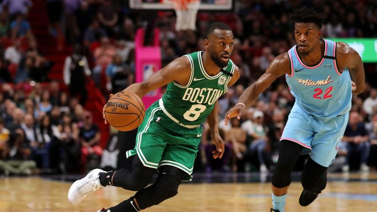 Kemba Walker #8 of the Boston Celtics drives to the basket against Jimmy Butler #22 of the Miami Heat during the second half at American Airlines Arena on January 28, 2020 in Miami, Florida. 