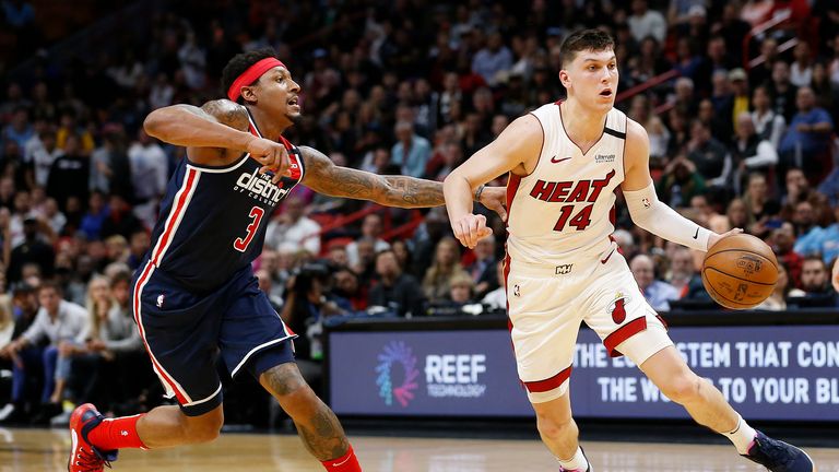 Tyler Herro #14 of the Miami Heat drives to the basket against Bradley Beal #3 of the Washington Wizards during the second half at American Airlines Arena on January 22, 2020 in Miami, Florida.