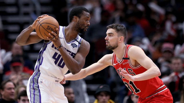  Harrison Barnes #40 of the Sacramento Kings handles the ball while being guarded by Tomas Satoransky #31 of the Chicago Bulls in the third quarter at the United Center on January 24, 2020 in Chicago, Illinois.